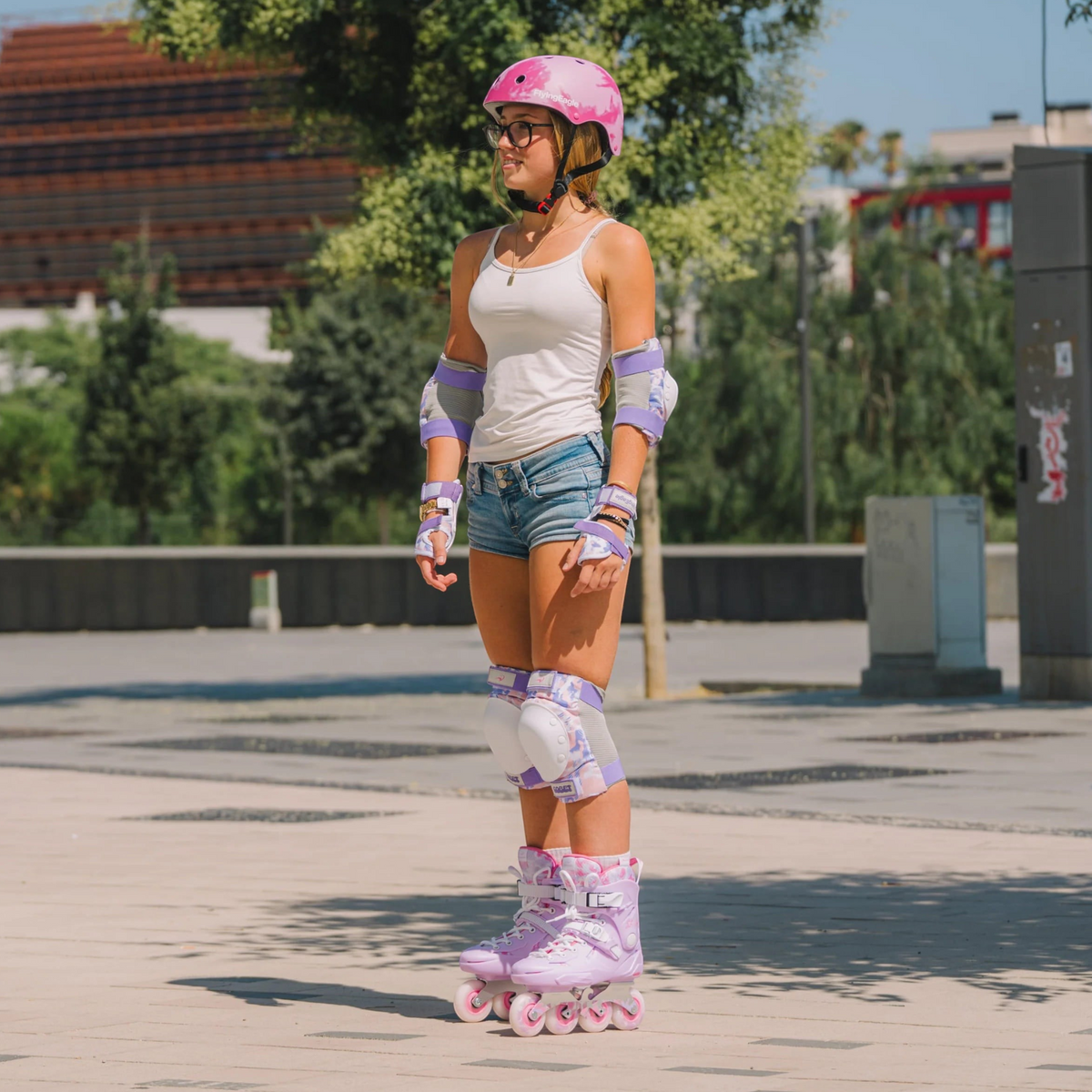 Patinadora com kit de proteção FlyingEagle Cobet 2026 roxo